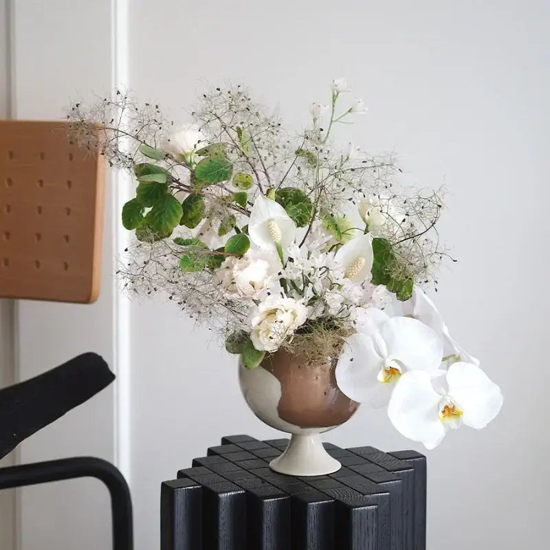 Irregular grain black & white spherical vase living room decor