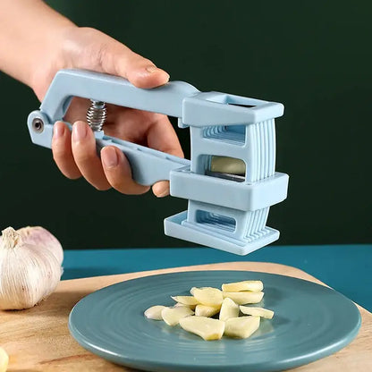 Light blue spring loaded garlic press slicer – kitchen tool