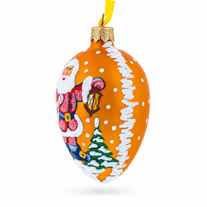 Santa With Lantern Glass Christmas Ornament 4 Inches