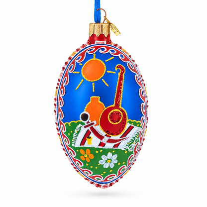 Kozak with Kobza Ukrainian Glass Egg Ornament 4 Inches