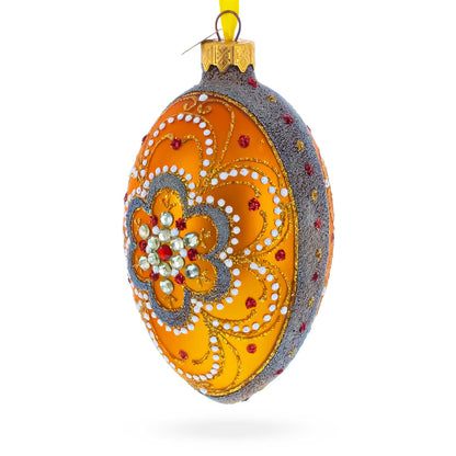 White Flower On Orange Glass Egg Ornament 4 Inches