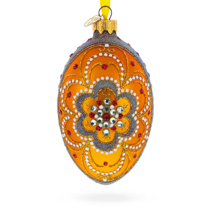 White Flower On Orange Glass Egg Ornament 4 Inches