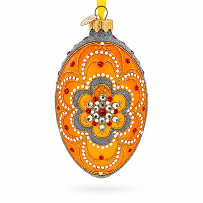 White Flower On Orange Glass Egg Ornament 4 Inches