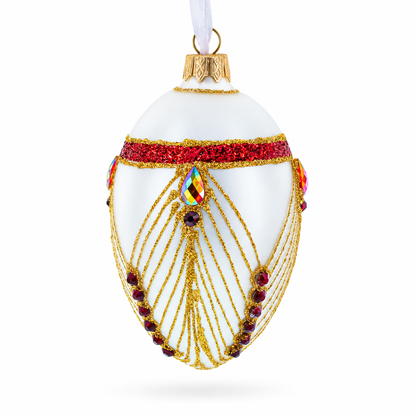 Red Jewels Eccentrics on White Glass Egg Ornament 4 Inches
