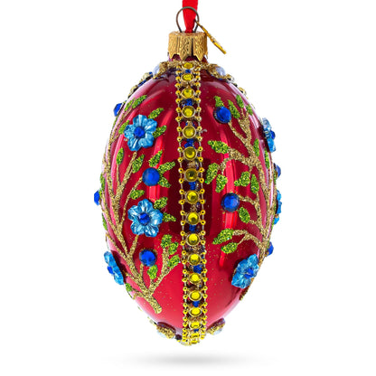 Blue Bejeweled Flowers on Red Glass Egg Ornament 4 Inches