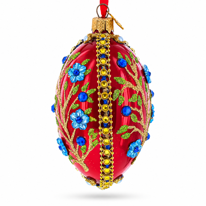 Blue Bejeweled Flowers on Red Glass Egg Ornament 4 Inches
