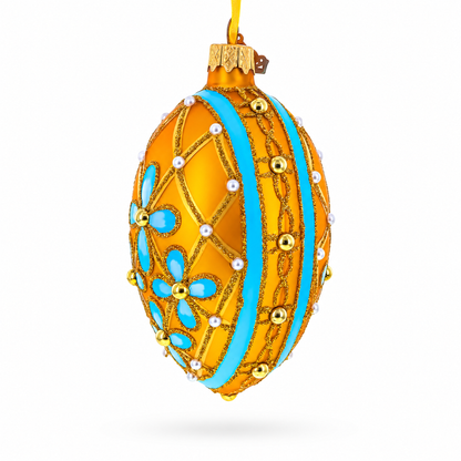 Blue Flowers on Gold Glass Egg Ornament 4 Inches
