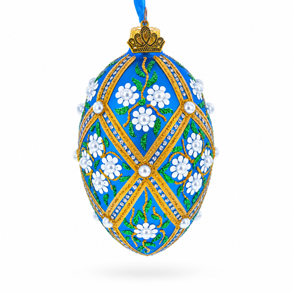 White Pearl Flowers on Blue Glass Egg Ornament 4 Inches