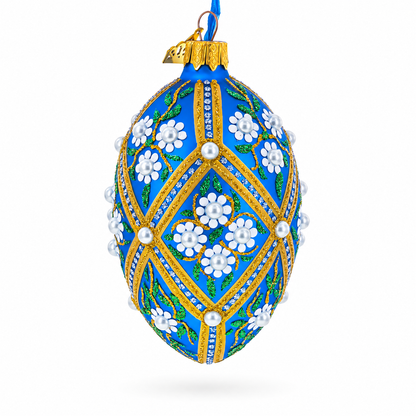 White Pearl Flowers on Blue Glass Egg Ornament 4 Inches