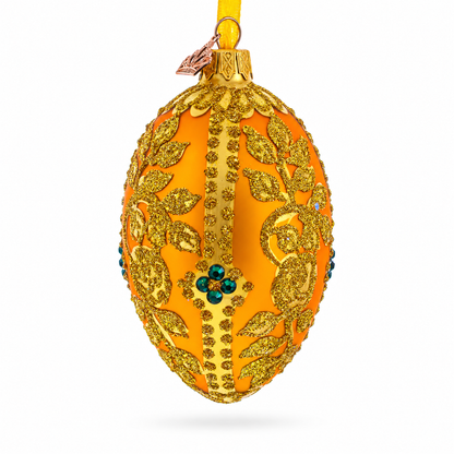 Glittered Golden Leaves Orange Glass Egg Ornament 4 Inches