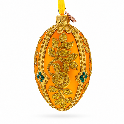 Glittered Golden Leaves Orange Glass Egg Ornament 4 Inches