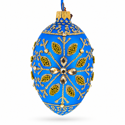 Golden Snowflake on Blue Glass Egg Ornament 4 Inches