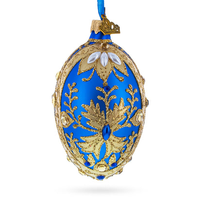 Golden Swirls on Blue Glass Egg Ornament 4 Inches