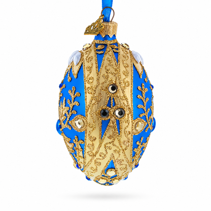 Golden Swirls on Blue Glass Egg Ornament 4 Inches