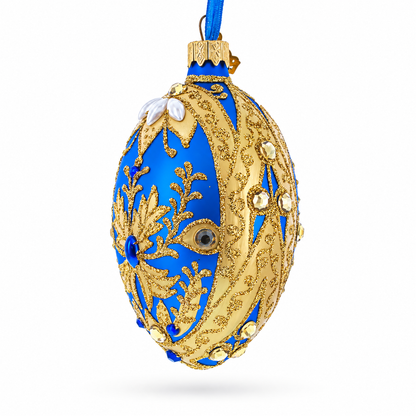 Golden Swirls on Blue Glass Egg Ornament 4 Inches