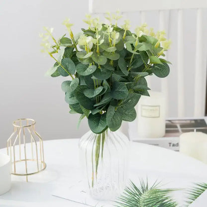 Lush artificial eucalyptus leaves garland with white flowers wedding decor