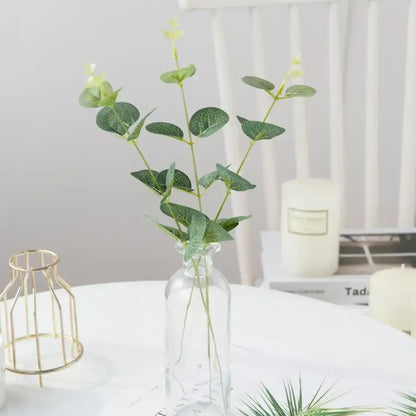 Lush artificial eucalyptus leaves garland with white flowers wedding decor