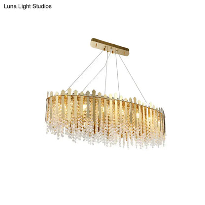Luxurious gold elliptical island light fixture with clear crystal dining room