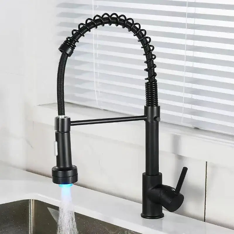 Luxury black & gold kitchen faucet with pull out spring hose