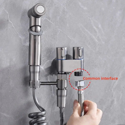 Matte black bidet spray set with coiled hose for bathroom