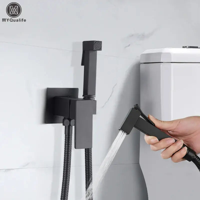 Matte black brass bidet faucet with handheld spray for bathroom