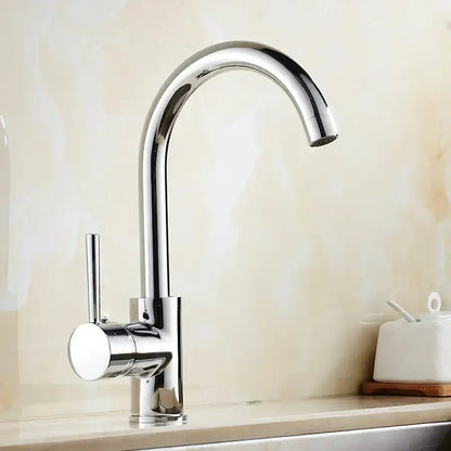 Matte black brass kitchen faucet with curved swivel spout