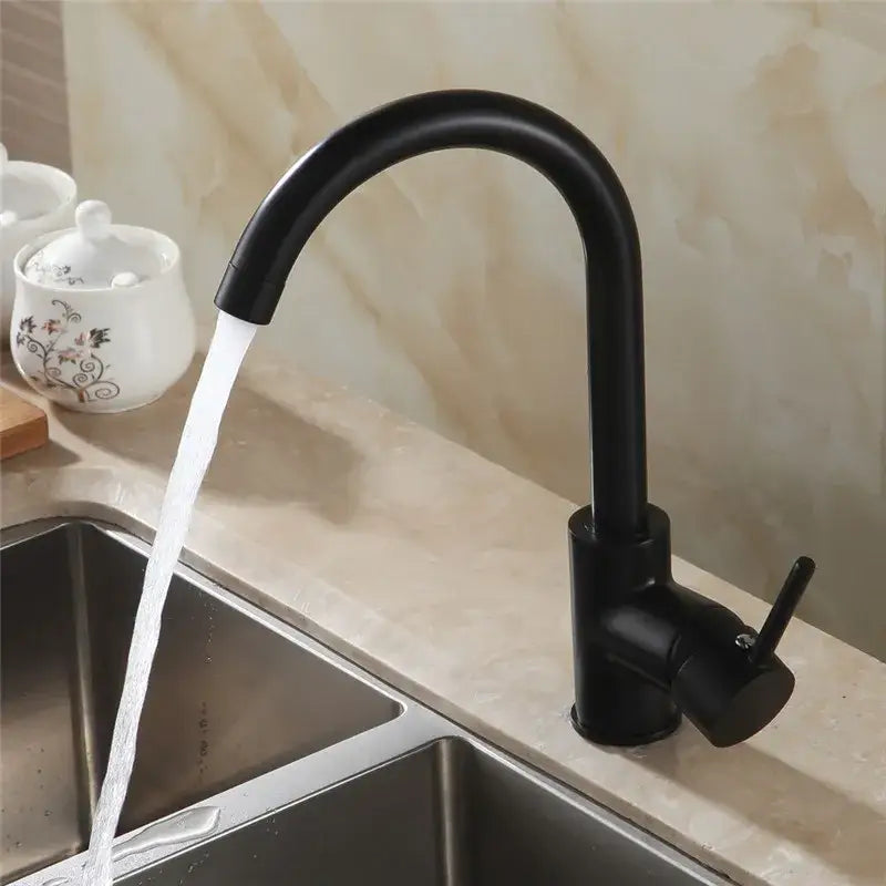 Matte black brass kitchen faucet with curved swivel spout