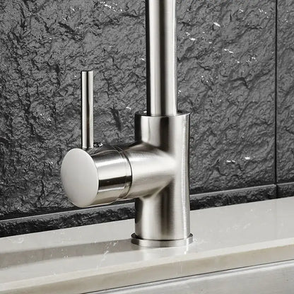 Matte black brass kitchen faucet with curved swivel spout
