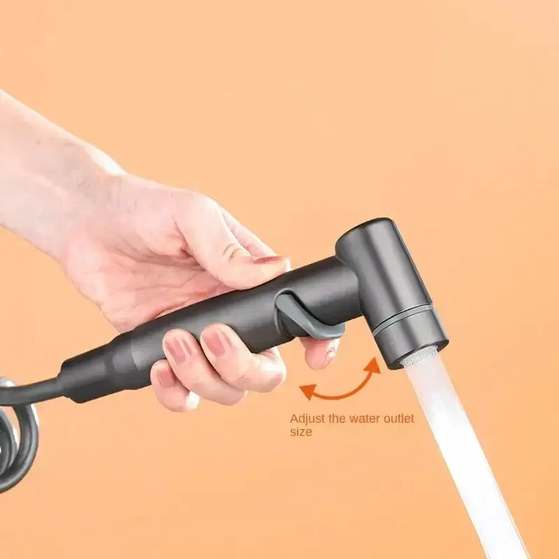 Matte black hygienic bidet sprayer with coiled hose for bathroom