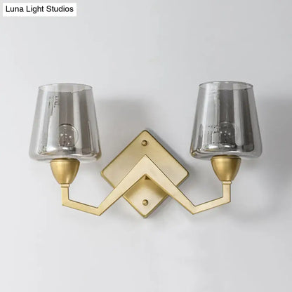 Mid-century brass wall lamp with truncated cone shade for bedroom
