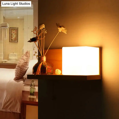Milk glass cube wall light with wood shelf bedroom sconce