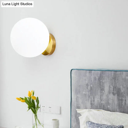 DecorBites™ Minimalist Bedside Sconce Light with White Glass Ball and Gold Wall Mount
