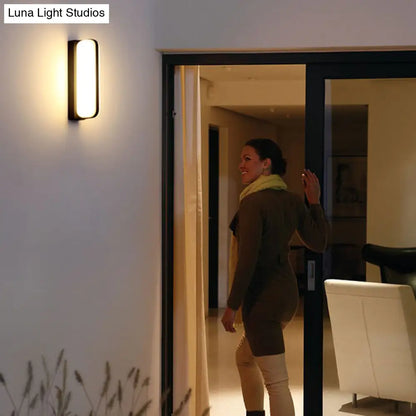 DecorBites™ Minimalist Black Acrylic LED Wall Sconce for Yard - Capsule Shape