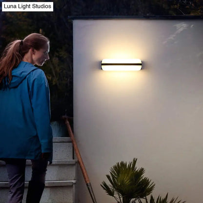 DecorBites™ Minimalist Black Acrylic LED Wall Sconce for Yard - Capsule Shape