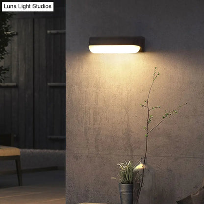 DecorBites™ Minimalist Black Acrylic LED Wall Sconce for Yard - Capsule Shape