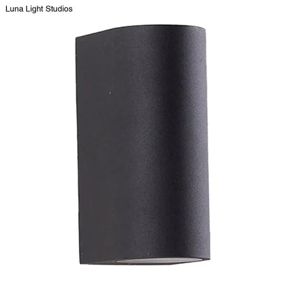 Minimalist black aluminum outdoor cylinder wall light outdoor space