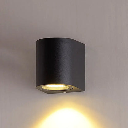 Minimalist black aluminum outdoor cylinder wall light outdoor space