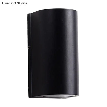 Minimalist black aluminum outdoor cylinder wall light outdoor space