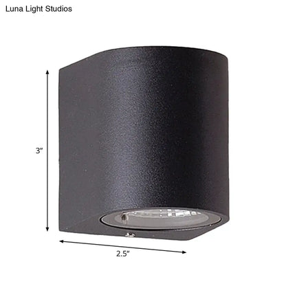 Minimalist black aluminum outdoor cylinder wall light outdoor space