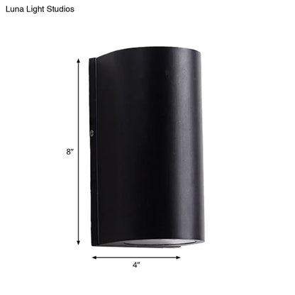 Minimalist black aluminum outdoor cylinder wall light outdoor space