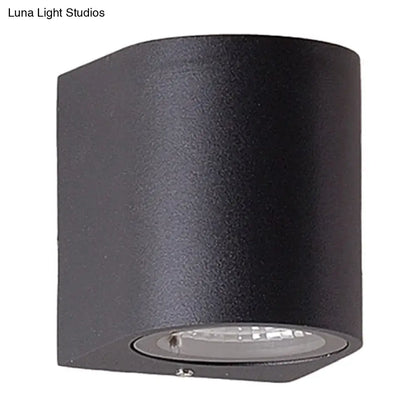 Minimalist black aluminum outdoor cylinder wall light outdoor space