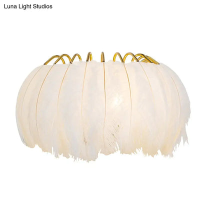Minimalist black and gold feather wall sconce bedroom light type