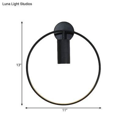 Minimalist black circular metal sconce – living room wall light