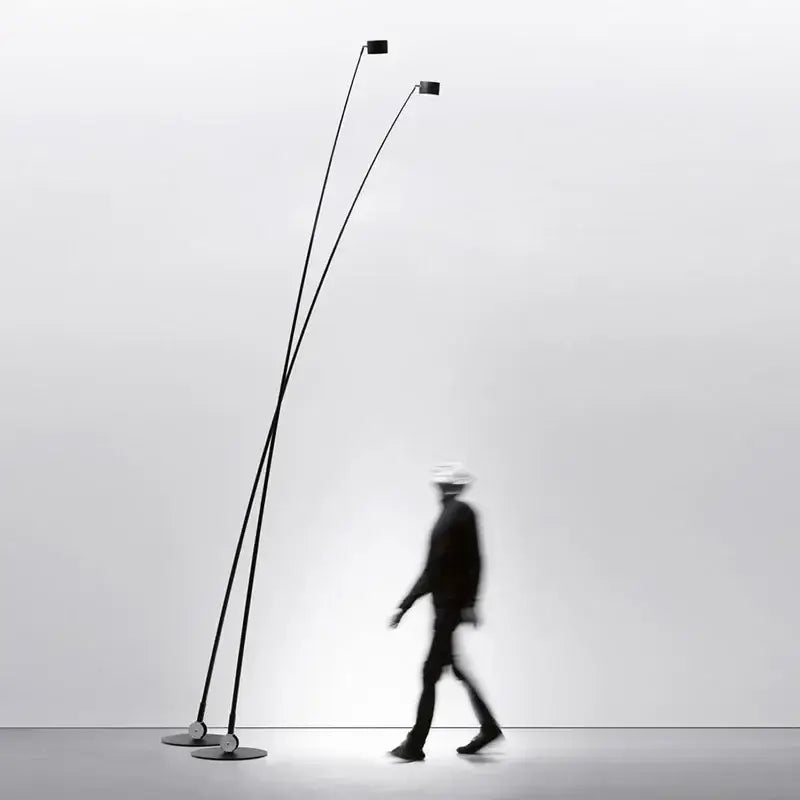 Minimalist black floor lamp with curved led arms for living room