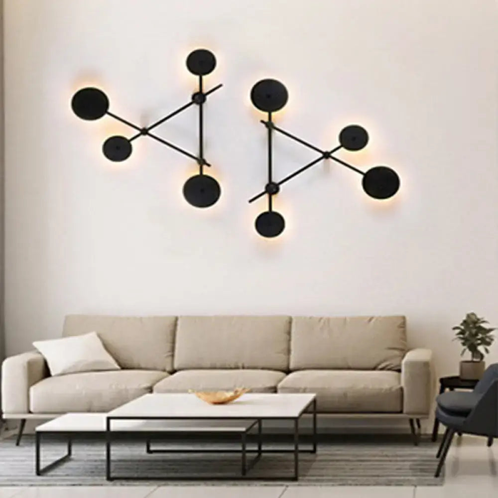 Minimalist black geometric wall light fixture for living room