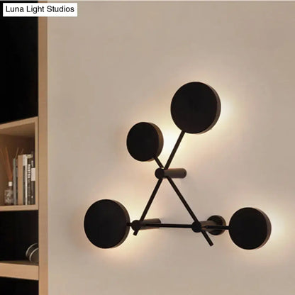 Minimalist black geometric wall light fixture for living room