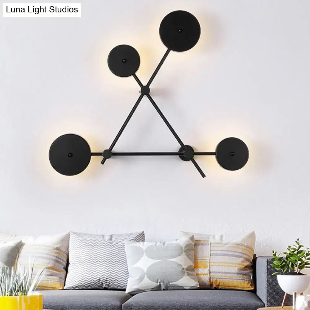 Minimalist black geometric wall light fixture for living room