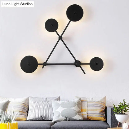 Minimalist black geometric wall light fixture for living room