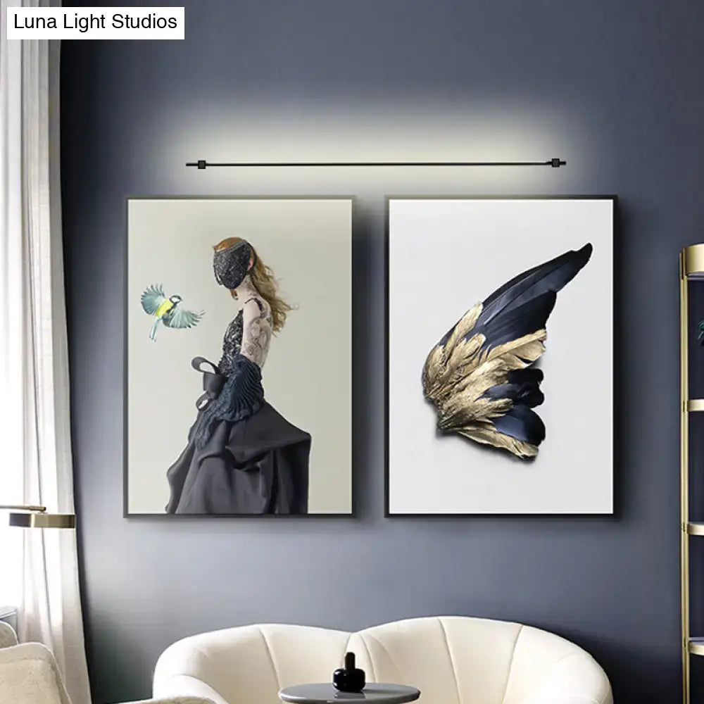 Minimalist black & gold feather wing wall lamp for living room