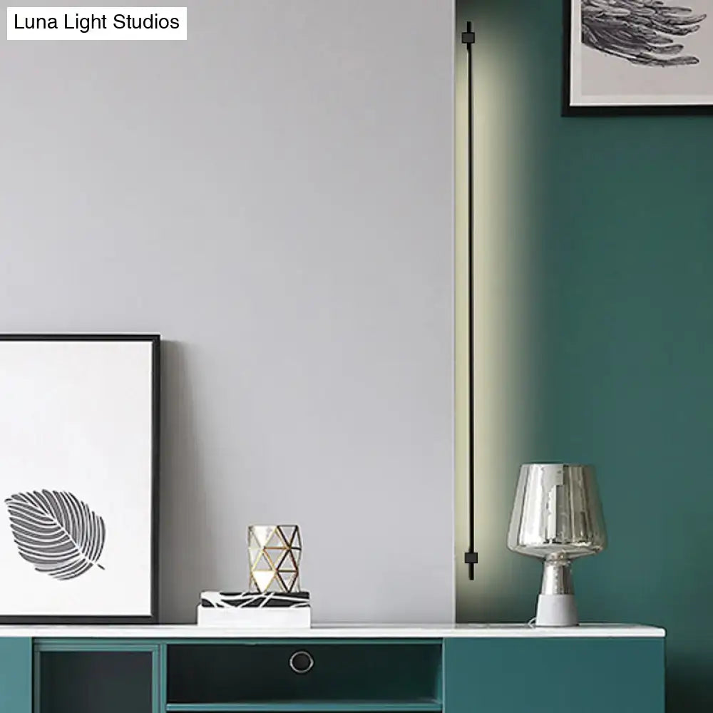Minimalist black & gold feather wing wall lamp for living room